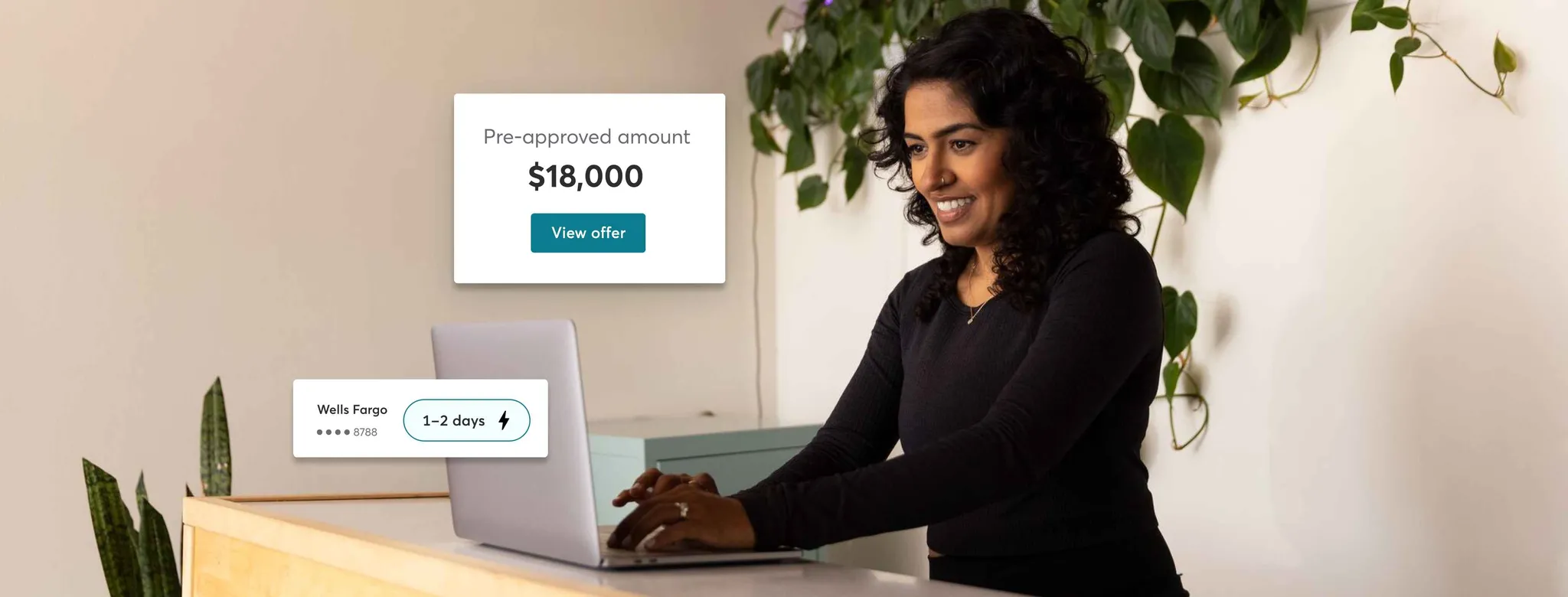 woman at desk with laptop 