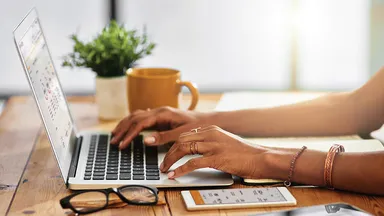Women working on a laptop