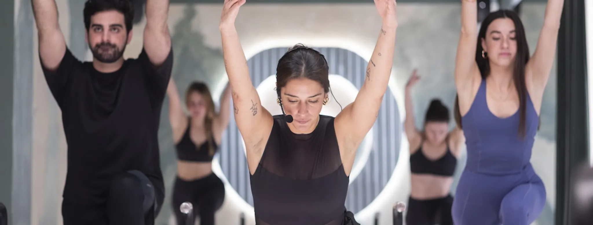 People taking a pilates class