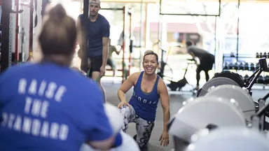 Client smiling in fitness business