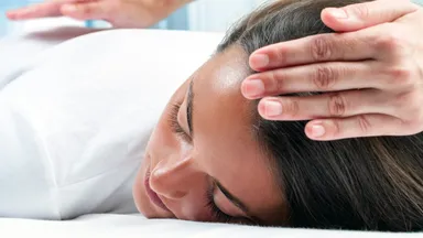 Person laying on massage table