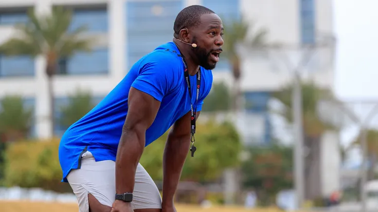 Man teaching group fitness