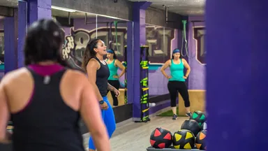 Alyssa Charbonneau teaching a class at Liber8Fit