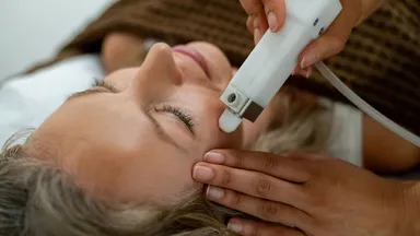 Woman receiving medical spa treatment at spa