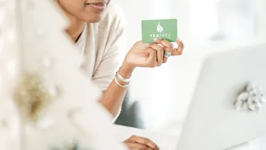 Person holding gift card