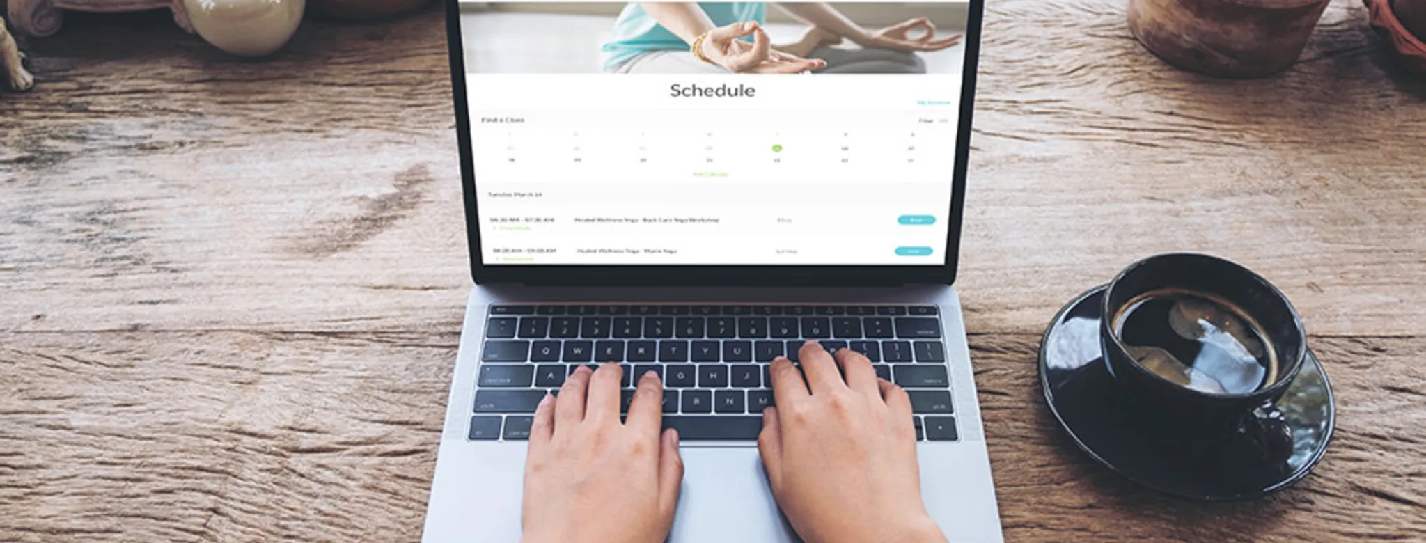 Woman using MINDBODY branded web tools