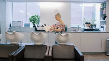 A stylist at Takamichi Hair Salon