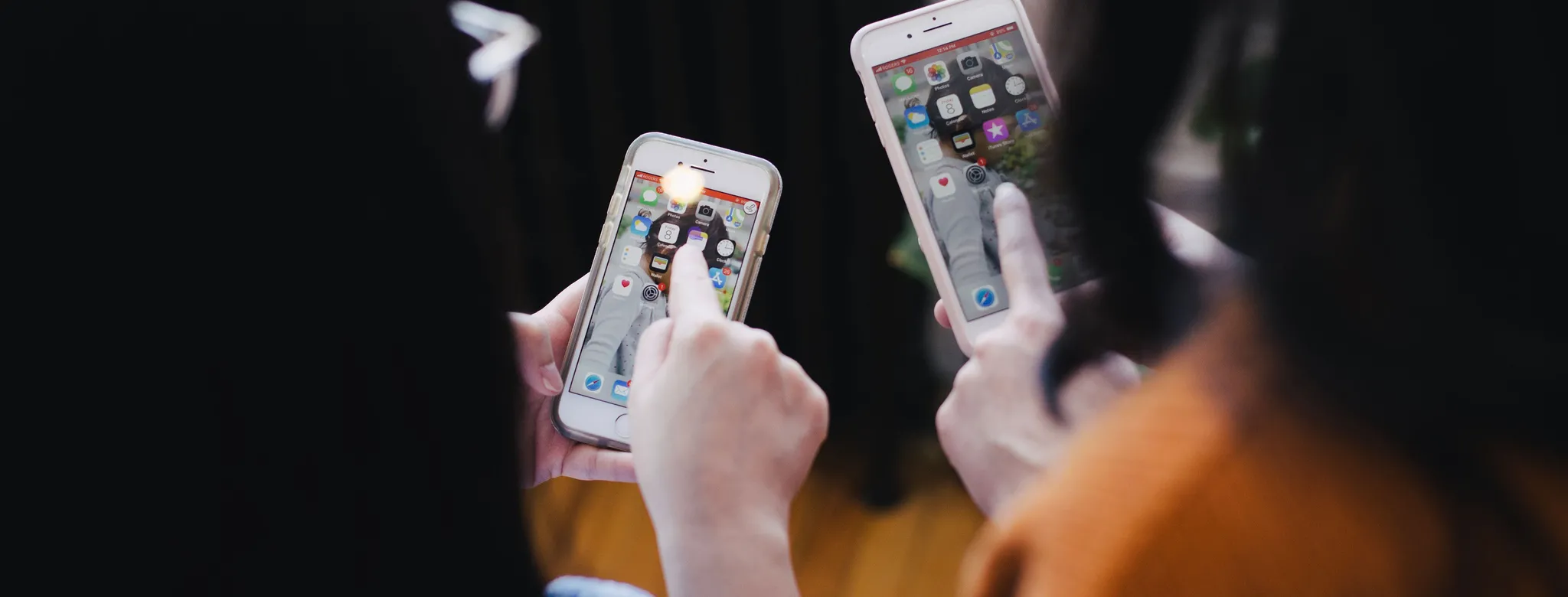 two women on their smartphone