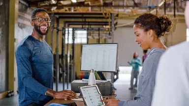 Happy people at front desk