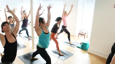 women in yoga studio