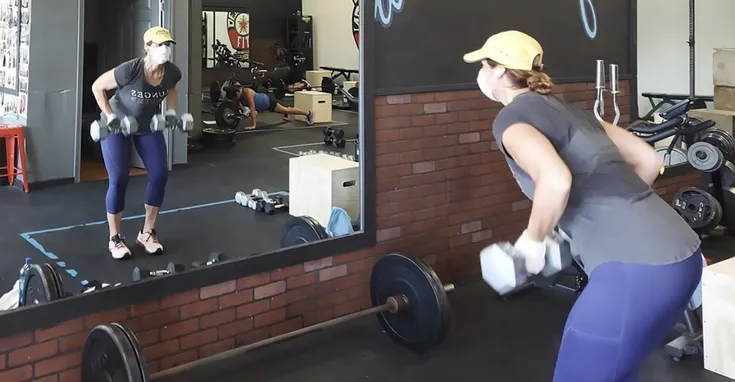 A woman working out at Your Destination Fit