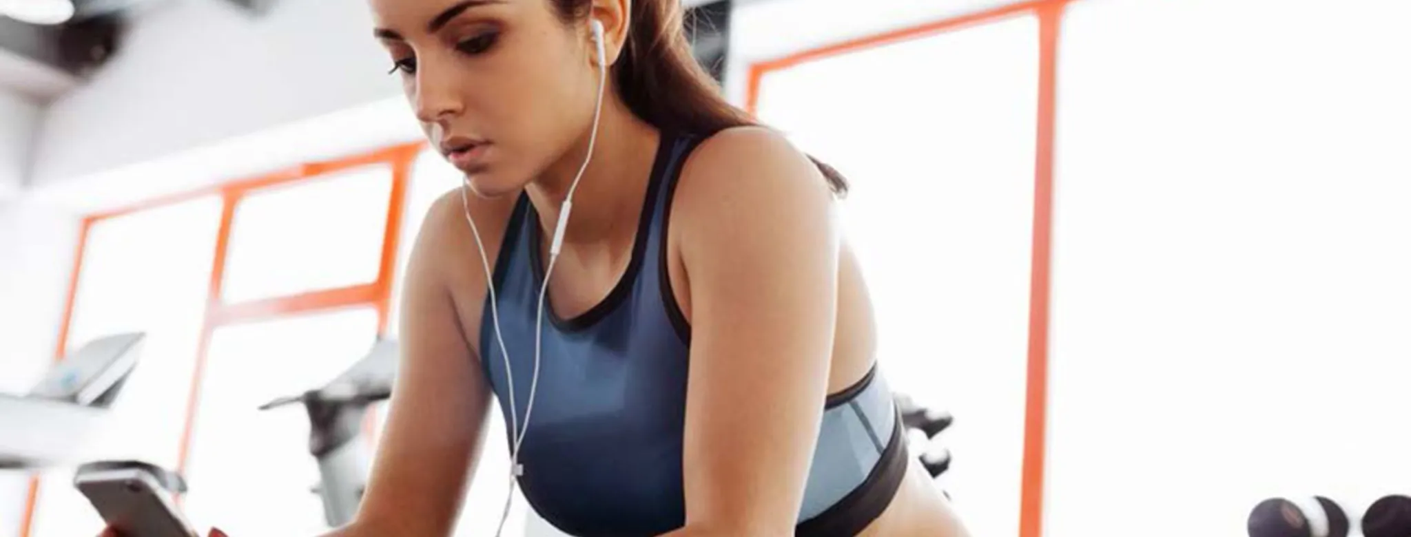 A woman leaving a review for a gym