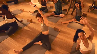 People taking a yoga class.